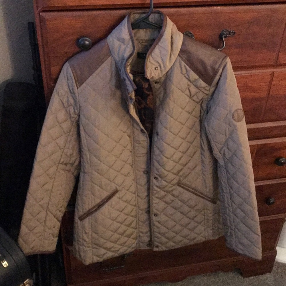 Bought new last year. Wore once. Not my style.